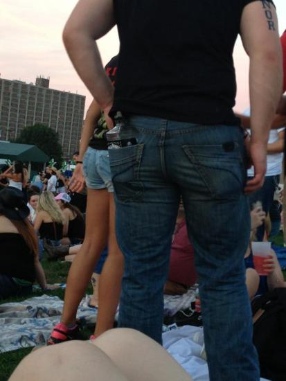 I still don't know how this guy snuck a whole bottle of Jack Daniels into the concert...